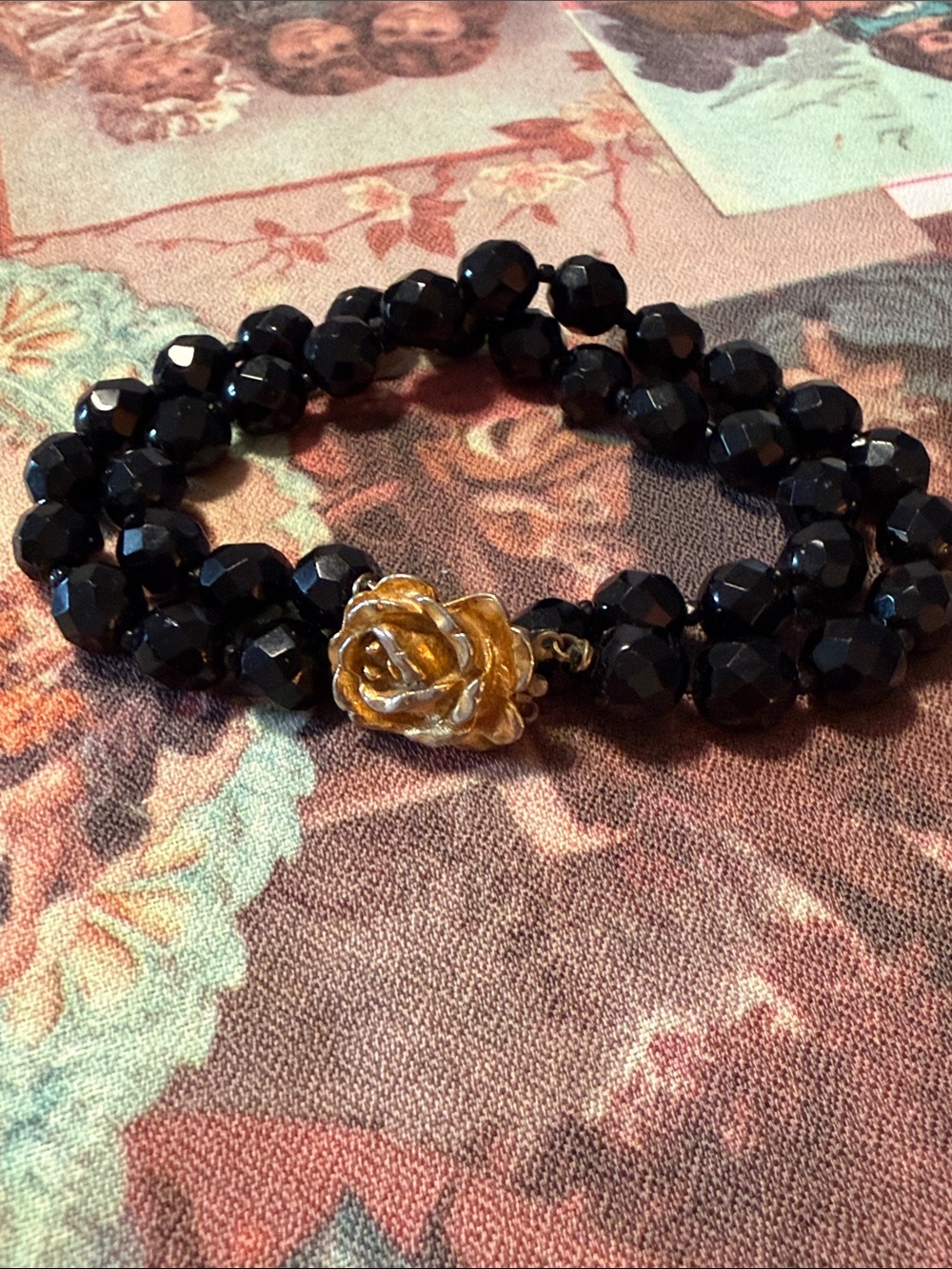 Black Beaded Bracelet with Gold Rose Accent